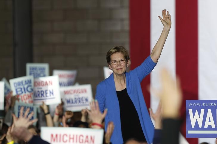 Senator Elizabeth Warren waving to supporters at her Super Tuesday night rally.