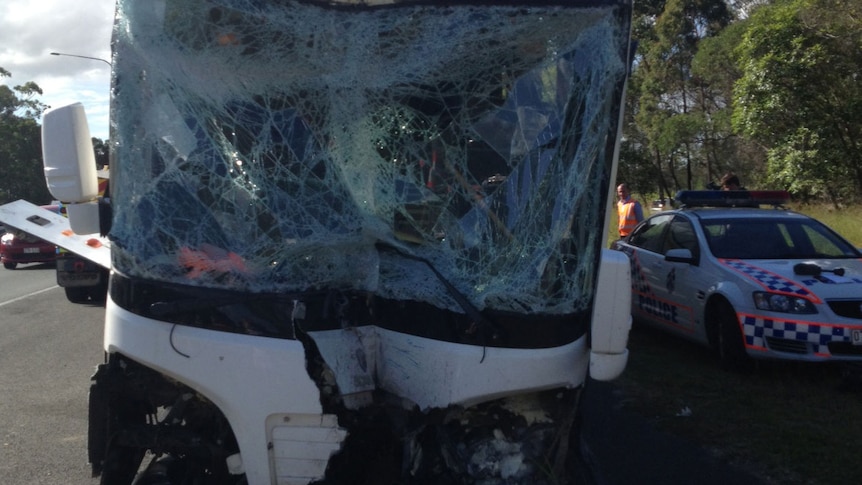 The bus wiped out a massive sign and ended up on the walkway and verge of the Logan Motorway overpass.