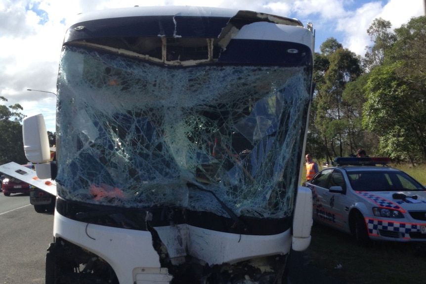 The bus wiped out a massive sign and ended up on the walkway and verge of the Logan Motorway overpass.