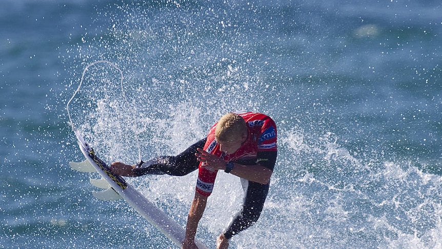 Mick Fanning was bundled out by 34th ranked Travis Logie