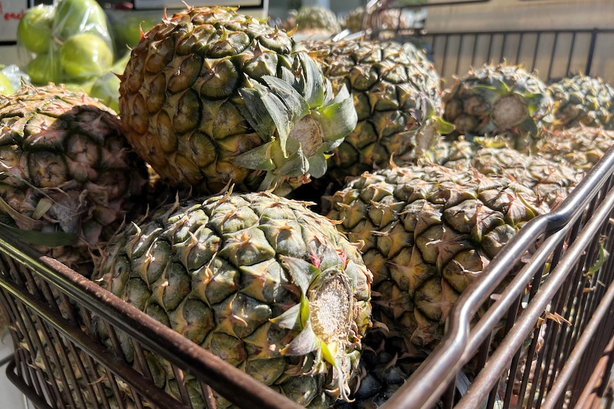 pineapples in a trolley 