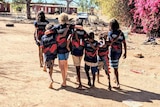 Kids walk near the Purnululu School