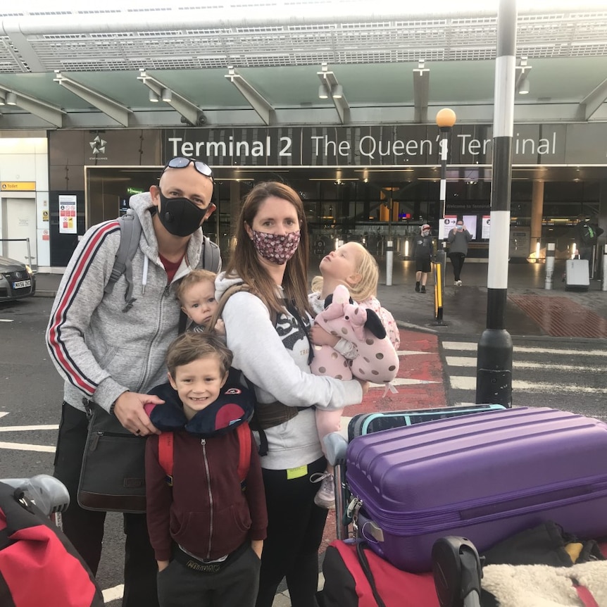 The Smith's with their three children and a lot of luggage.