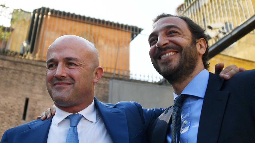 Italian journalists Gianluigi Nuzzi and Emiliano Fittipaldi leaving Vatican city after the verdict.