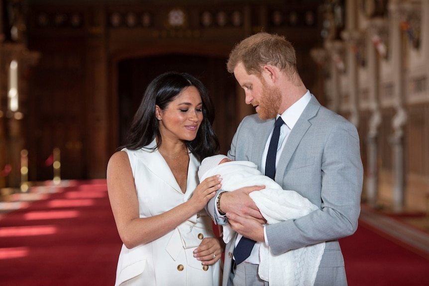 Meghan and Harry hold newborn Archie in 2019