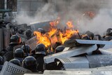Riot police clash violently with protesters in Kiev, Ukraine.