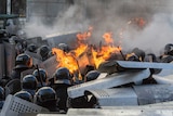 Riot police clash violently with protesters in Kiev, Ukraine.