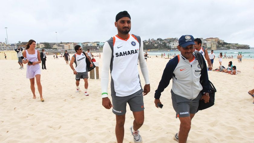 Indian cricketer Harbhajan Singh, centre, with team-mates on an impromptu visit to Sydney's Bondi Beach.