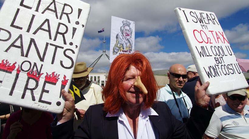 A protester wearing a Julia Gillard wig and fake nose at an anti-carbon tax rally in Canberra on March 23, 2011.