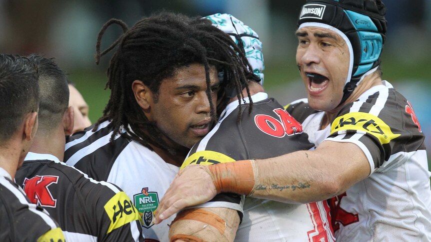 Idris congratulated after scoring against Raiders