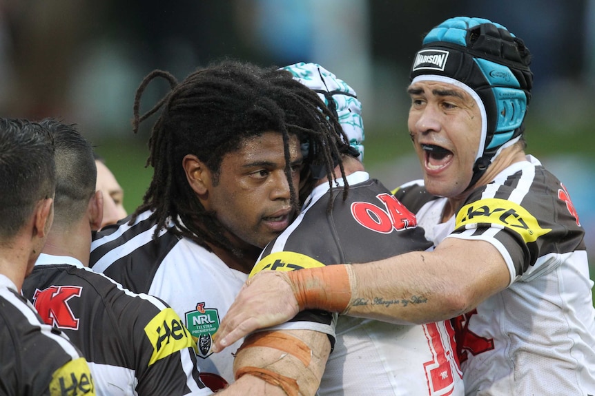 Idris congratulated after scoring against Raiders