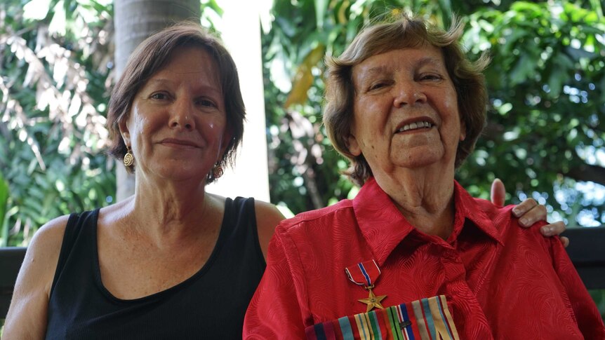 Betty and Ngaire Bowditch with Jim Bowditch's war medals.