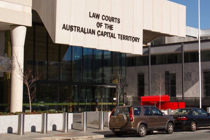 A large building complex signposted as the law courts of the ACT.