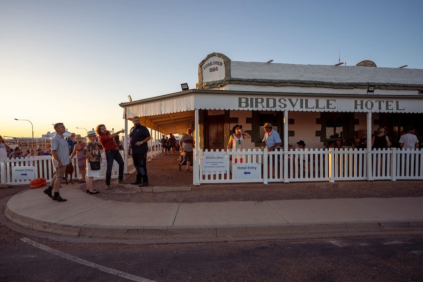 Tourists enjoy a sunset at the Birdsville pub in far south-west Queensland.