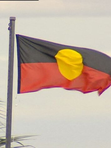 Generic TV still of Aboriginal flag flying on Palm Island, off Townsville in north Qld.