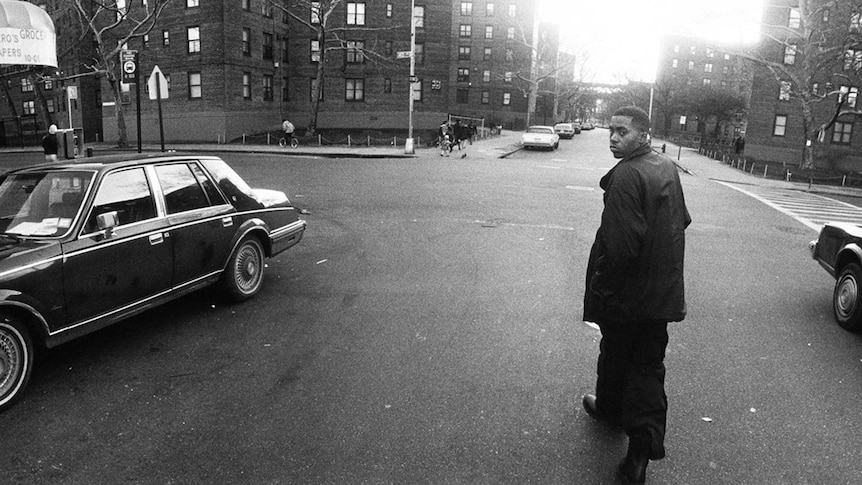 New York City rapper Nas walks through the Queensbridge housing estate