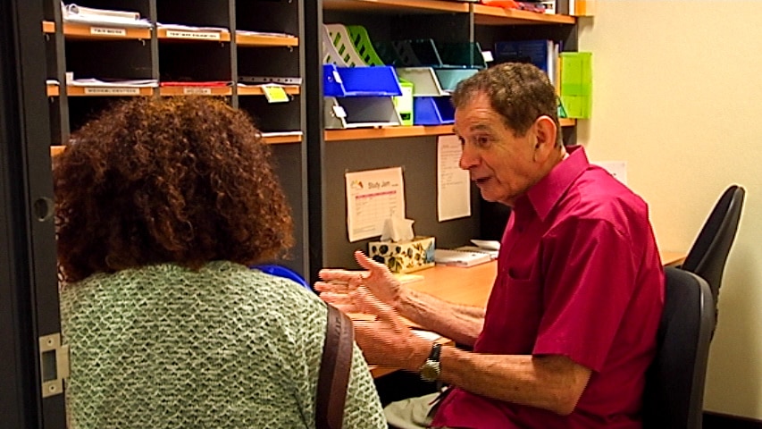 Eddie in his Multicultural Inc office