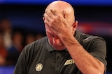 Australia head coach Brian Goorjian puts his hand on his head during a Boomers loss at the FIBA World Cup.