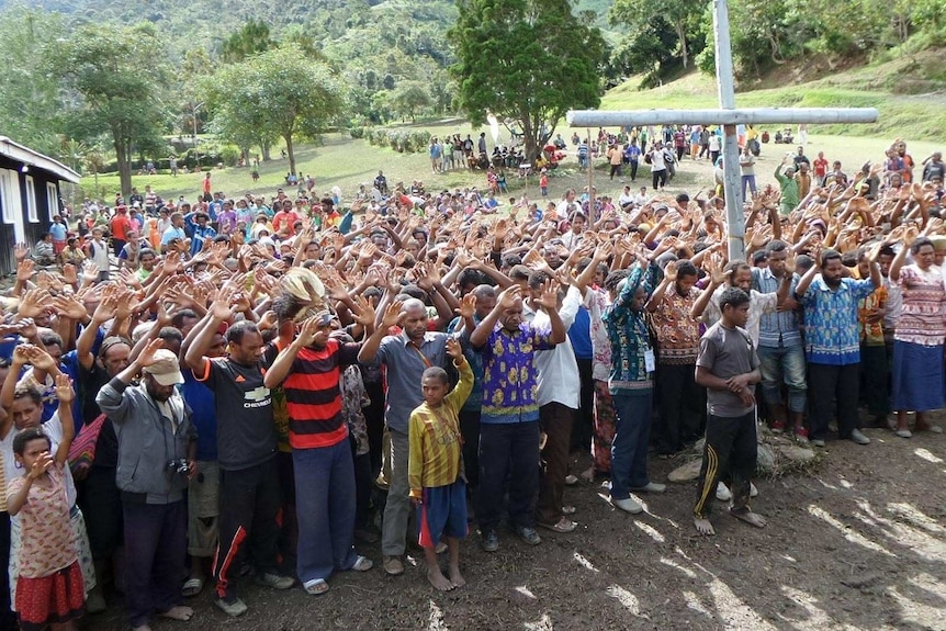 Christians praying in the central Highlands of West Papua.