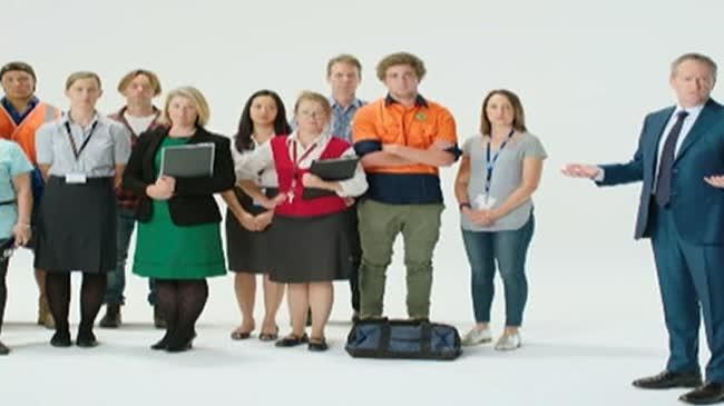A screenshot from a Labor "Australians First' jobs ad shows Bill Shorten with a group of white Australians.