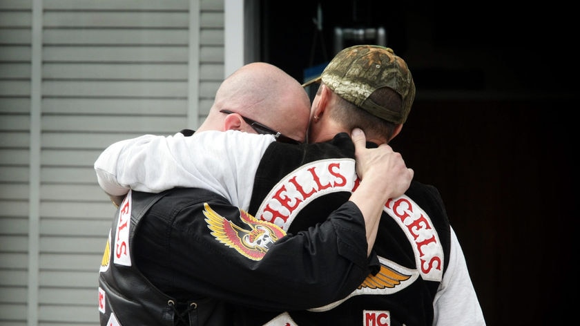 Grieving Hell's Angels members mourn during the funeral of Anthony Zervas