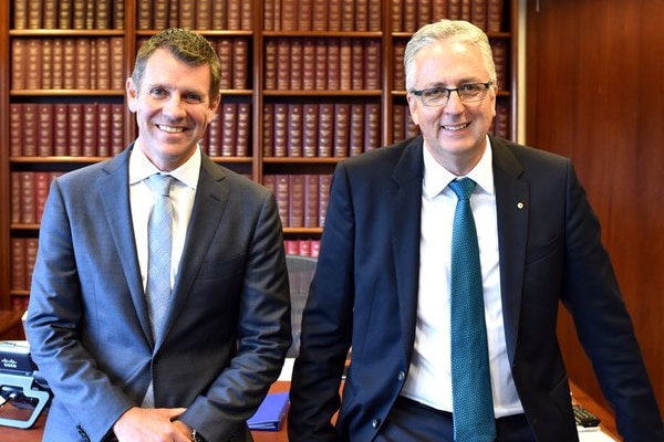 NSW Premier Mike Baird and former ABC MD Mark Scott in an office.