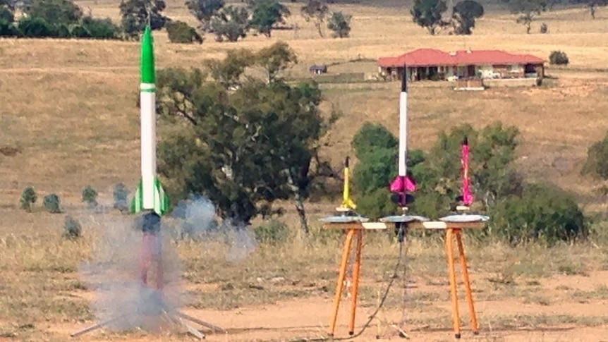 The model rockets are launched into the sky using an electronic ignition signal.