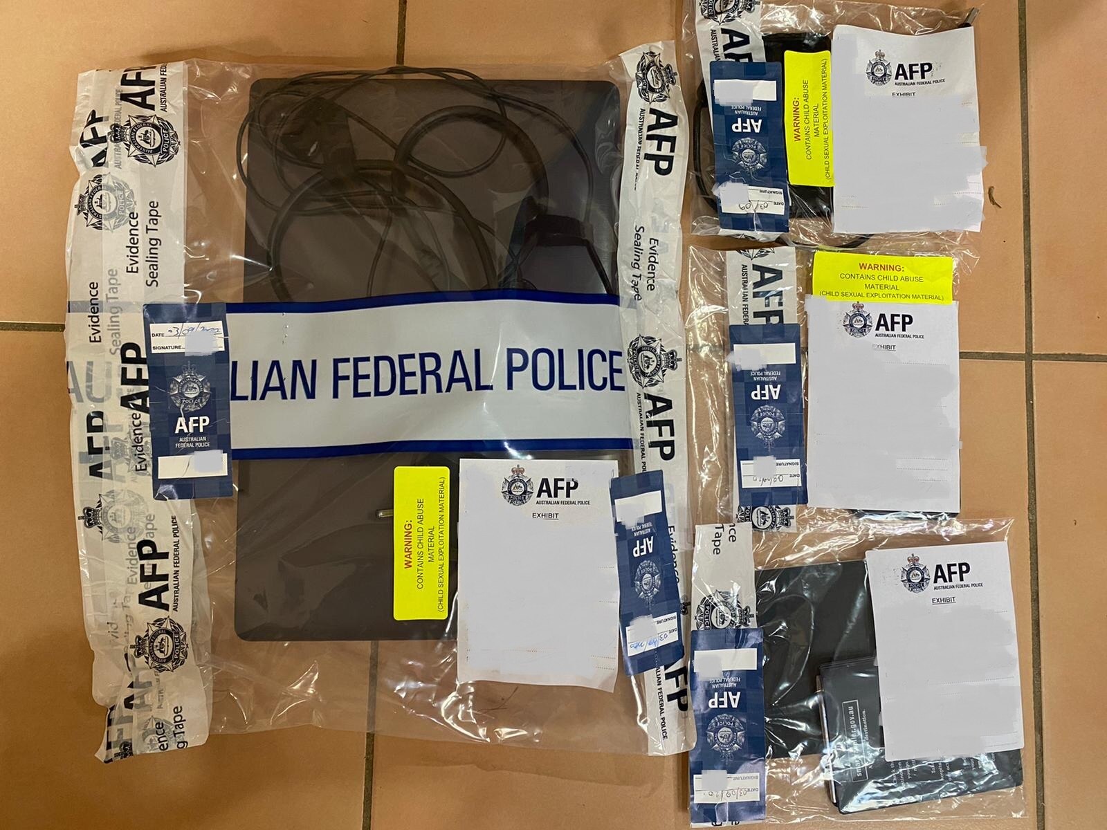 Various items including a laptop and other electronic devices in AFP possession
