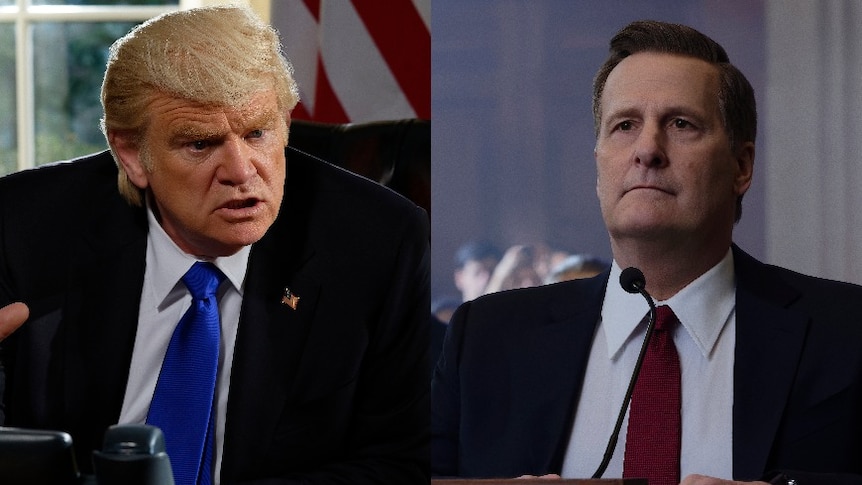 Brendan Gleeson as Donald Trump speaks at a desk while Jeff Daniels as James Comey stares straight ahead