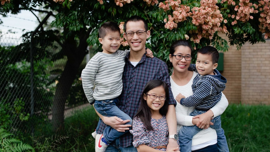 Eddie Woo with his family