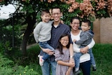 Eddie Woo with his family
