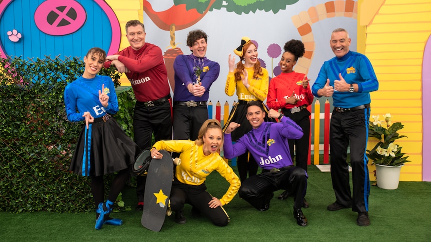 The cast of The Wiggles pose for a group photo in their skivvies.