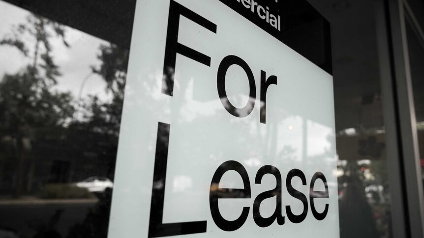 A for lease sign in a window