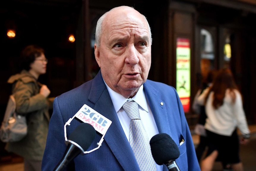 Alan Jones speaks to media