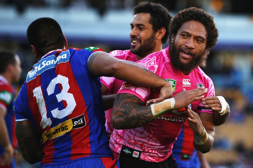 Vatuvei celebrates try against the Knights