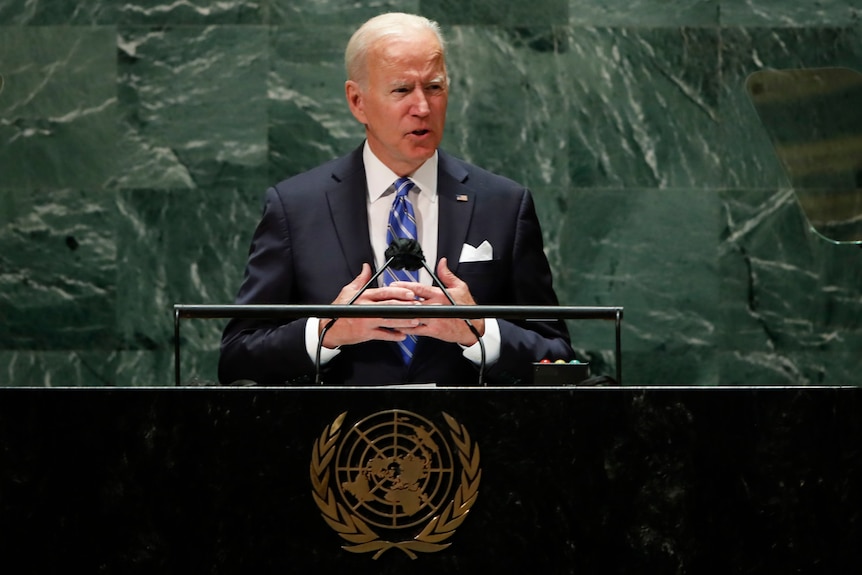 US President Joe Biden speaks from a lectern at the 76th session of the UN General Assembly in New York, September 21, 2021.