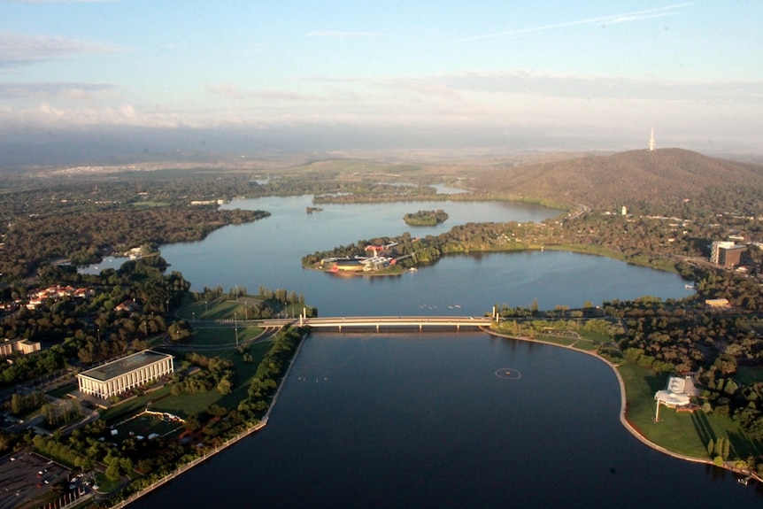 View from a hot air balloon above Lake Burley Griffin, with the National Library of Australia to the left