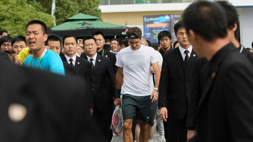 Federer well guarded in Shanghai
