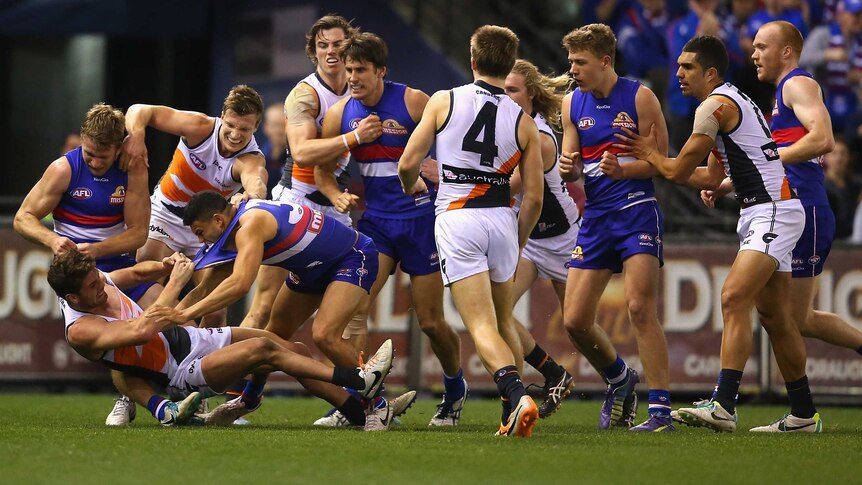 Bulldogs tussle with Giants