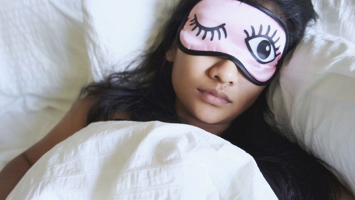 Girl sleeping with eyemask