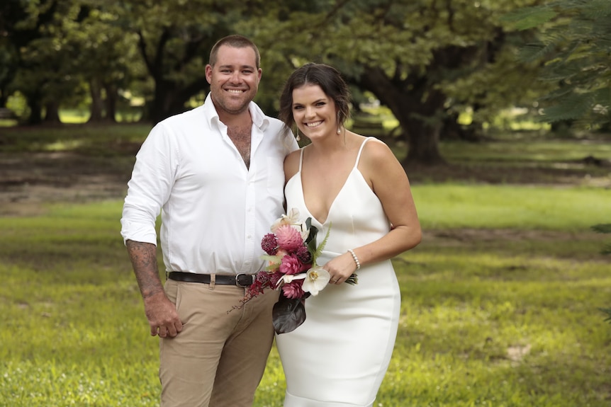 Jack and Molly Upstil in white on their wedding day. 