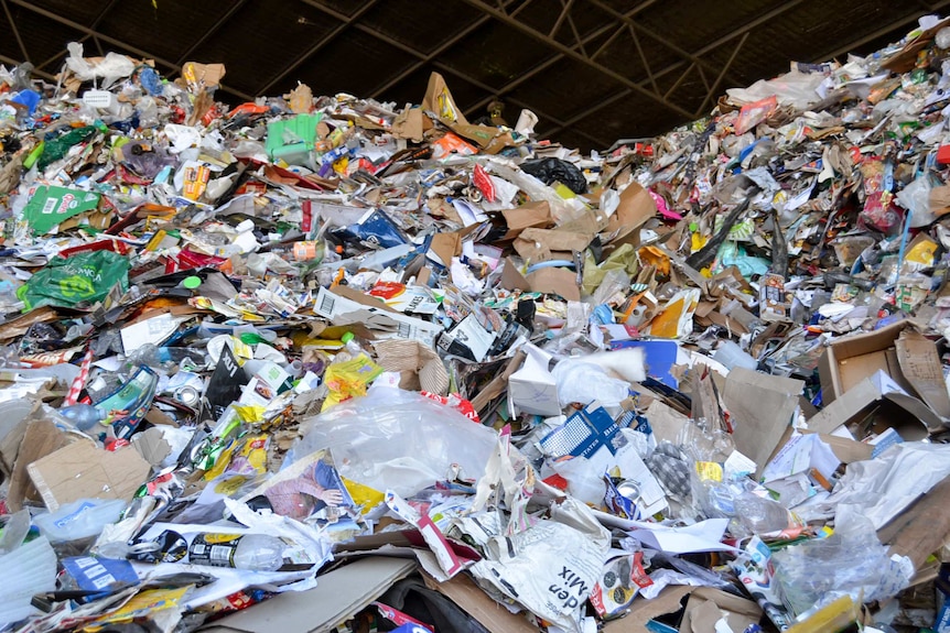 Huge pile of recyclables at the Hume recycling facility