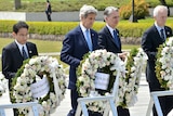 John Kerry visiting the Hiroshima memorial