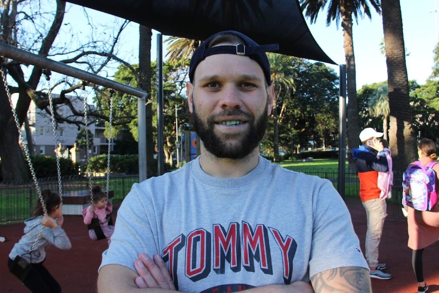 A man poses for a photo