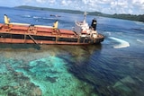 Oil is seen in the reef at Lavagu Bay.