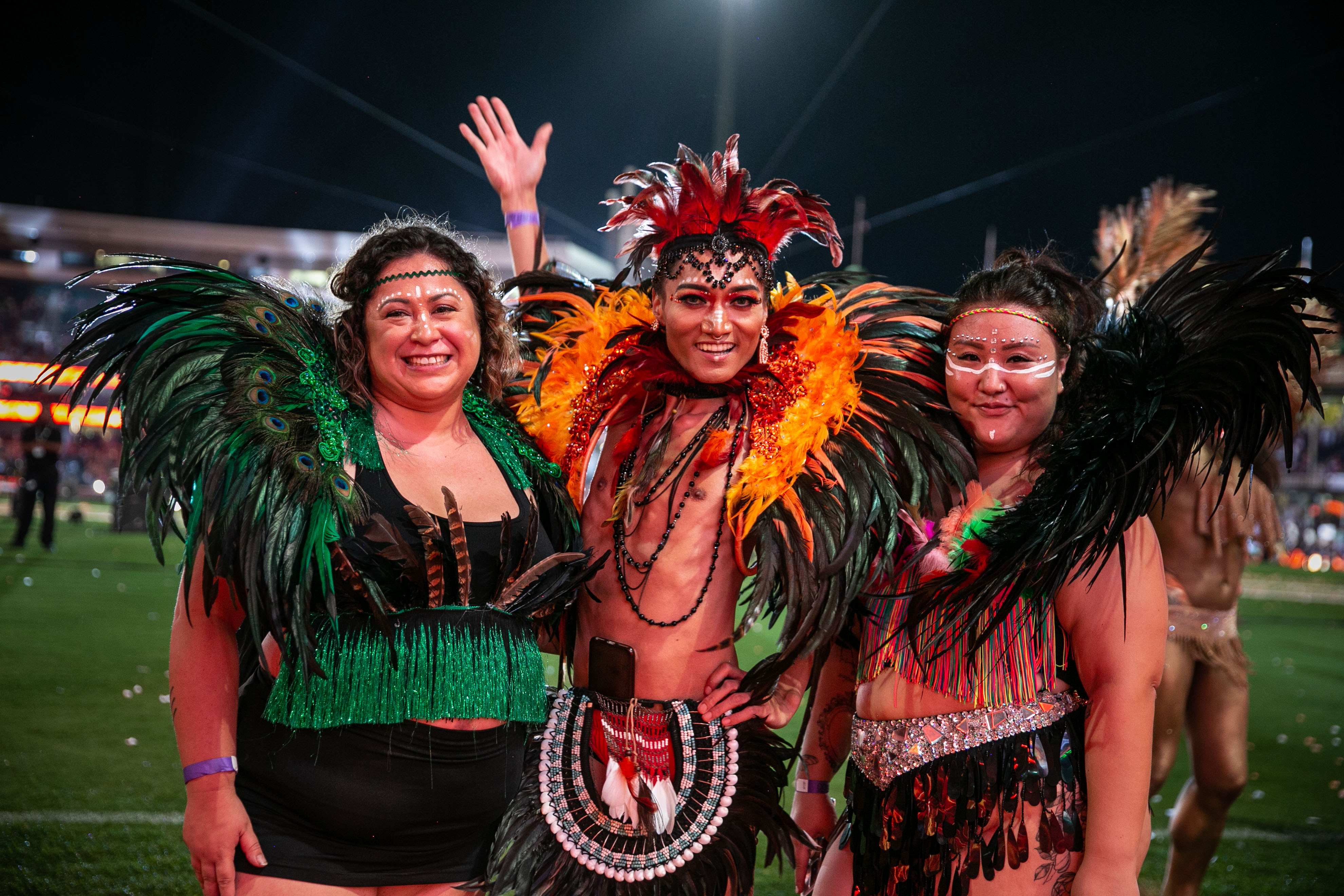 people wearing feathers