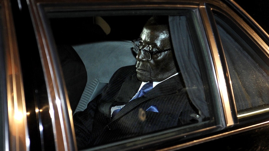 Robert Mugabe in the back of a car