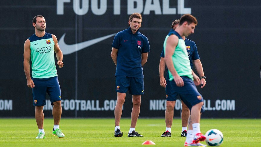 Barcelona coach Tito Vilanova looks on during a training session on July 18, 2013.