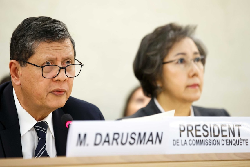 Marzuki Darusman, left, sitting next to Yanghee Lee, right