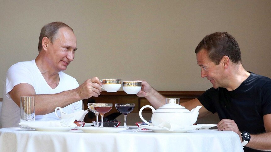 Vladimir Putin and Dmitry Medvedev having breakfast